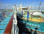 ID 2906 EXPLORER OF THE SEAS (2000/137308grt/IMO 9161728) - The midship Deck 11 pool area seen from Deck 12.